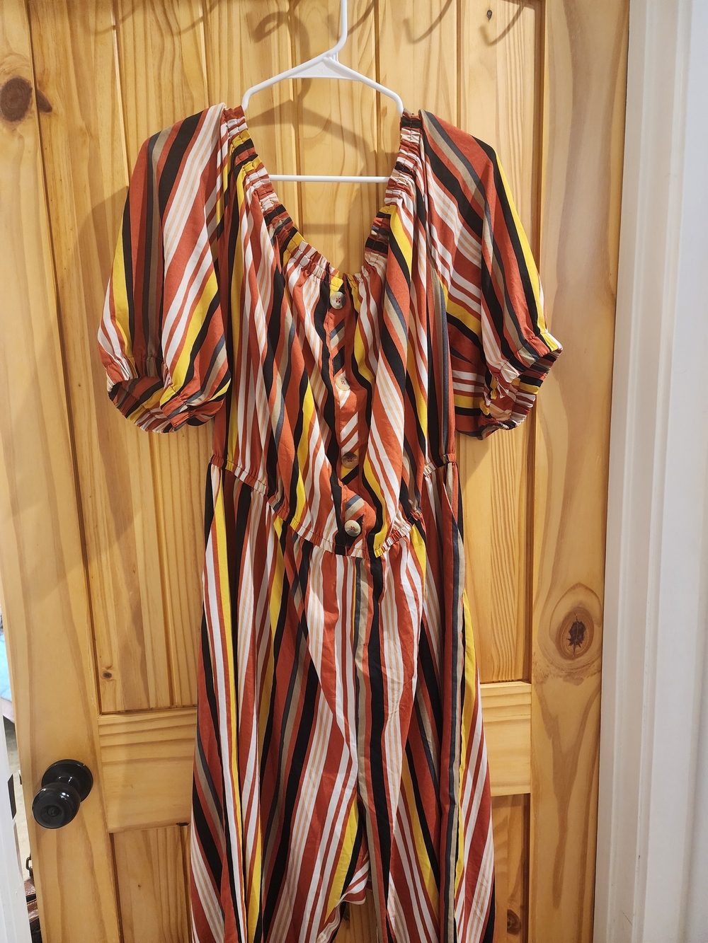 Multi Colored Striped Romper With Pockets And Wide Legs.